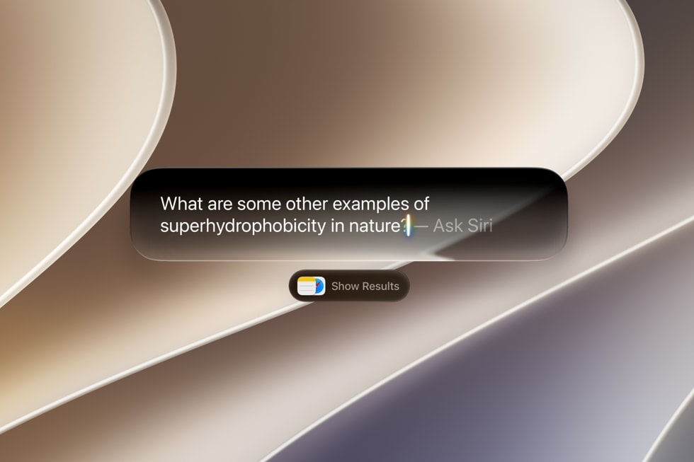 MacBook screen showing the new Siri AI integrated into Spotlight search in macOS 27 Golden Gate