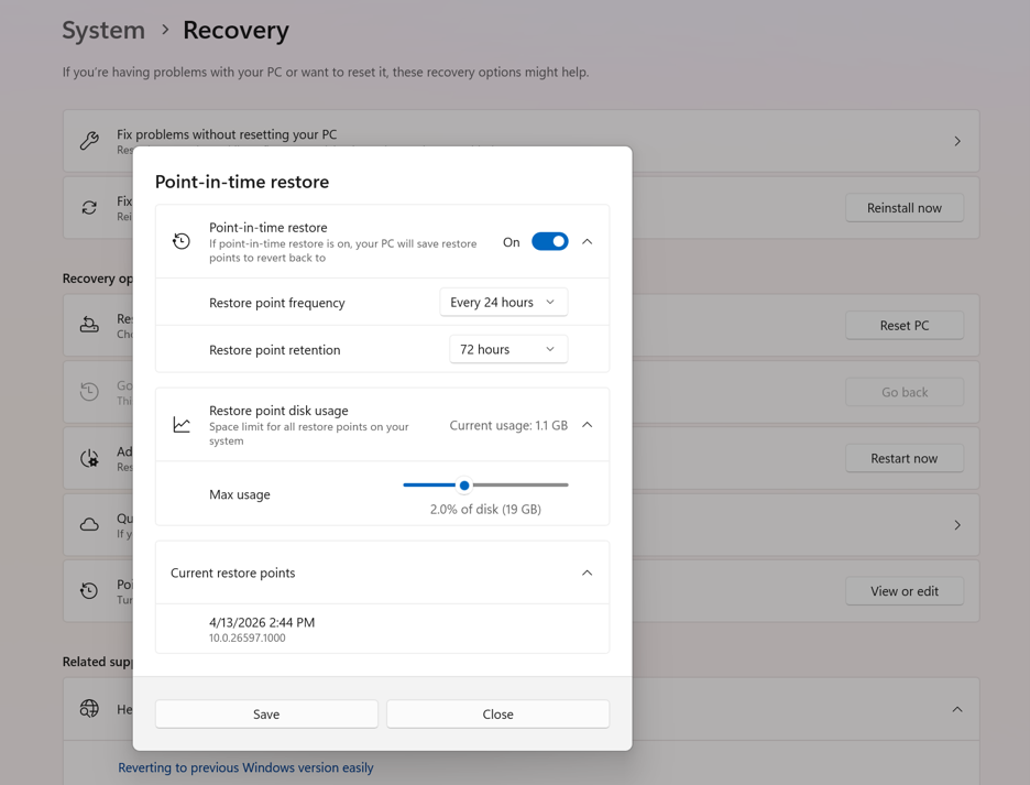 Point-in-time restore settings in Windows 11 showing restore point frequency, retention and disk usage options